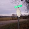 Faded Stop Sign on Cemetery Road